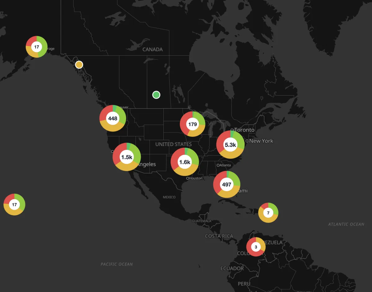 Donut clusters across North America — each ring is segmented by category, so the map shows both how many records are in each cluster and what mix they are.